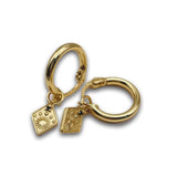 18 karat gold plated hoop huggies with sun and planets detail in a diamond dangle charm. 